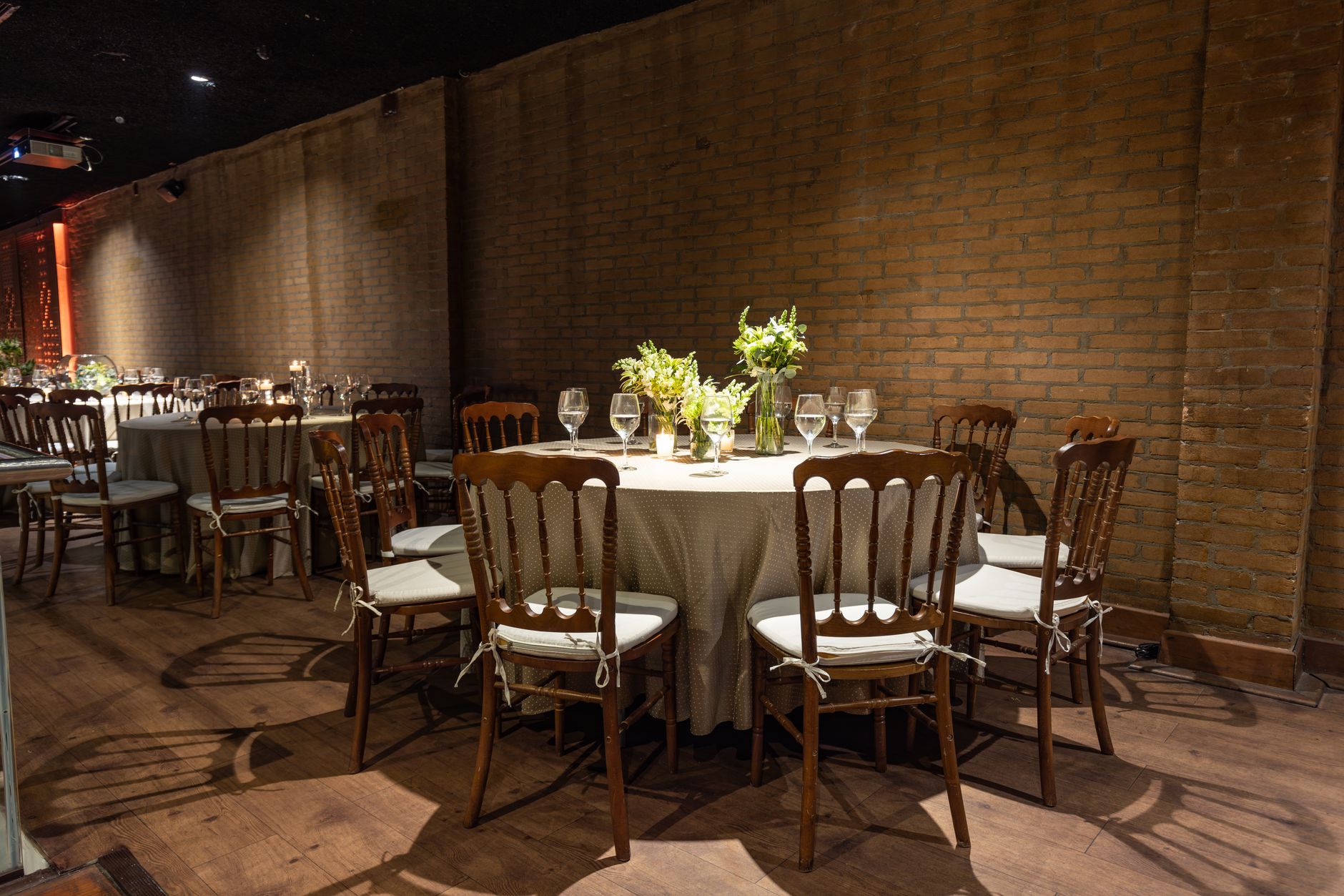 intimate gathering table arrangement in a cozy event space