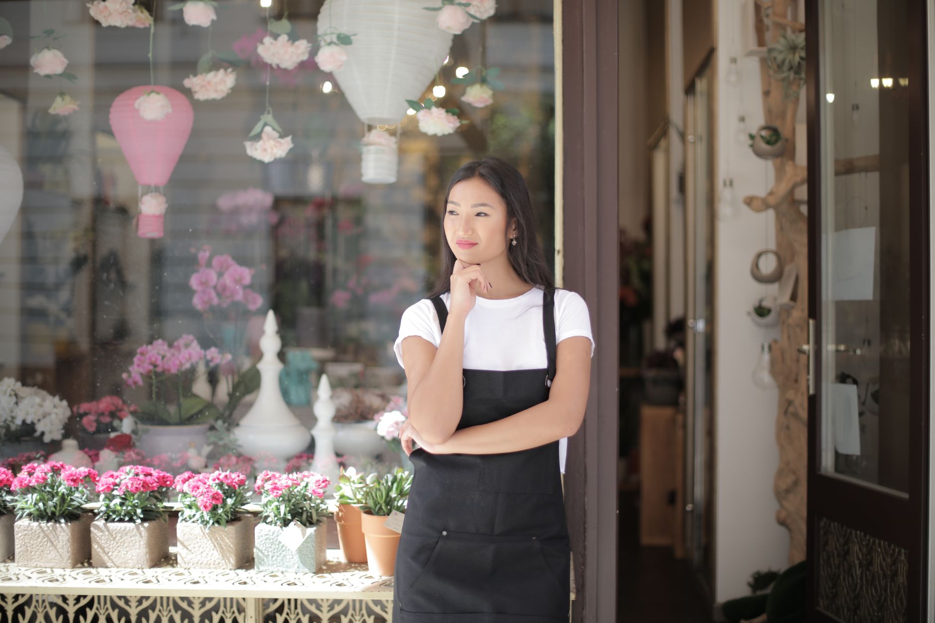 welcoming event planner standing in a boutique venue