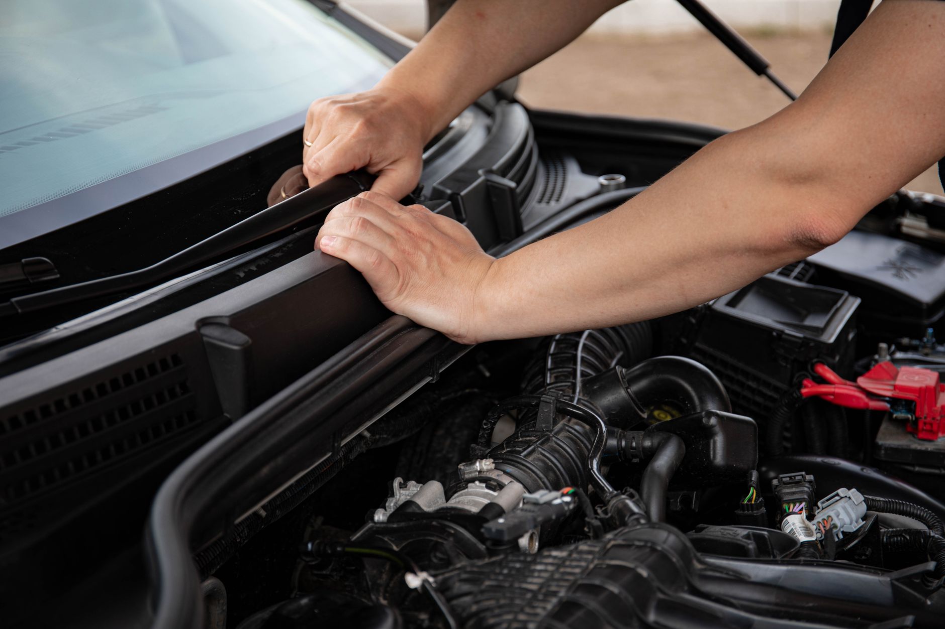 mechanic performing detailed vehicle inspection