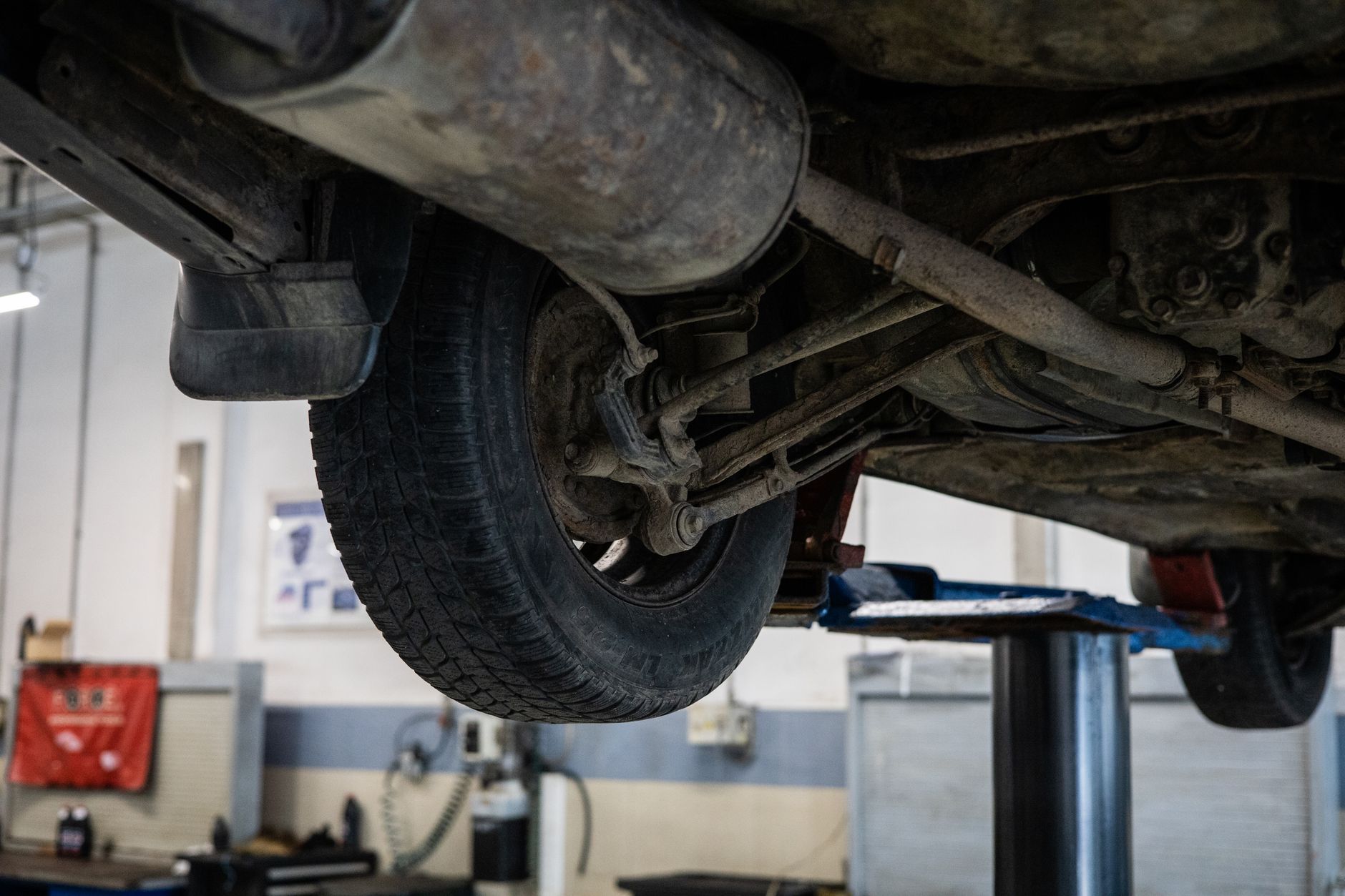 car suspension system inspection on lift